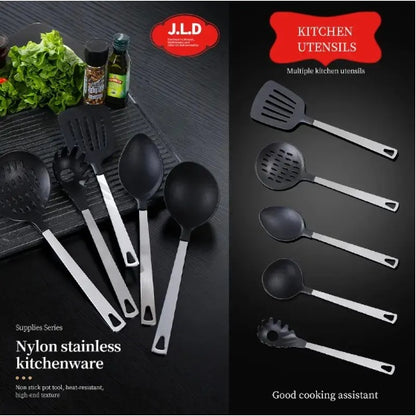 Set of black kitchen utensils with J.L.D branding on a dark surface.